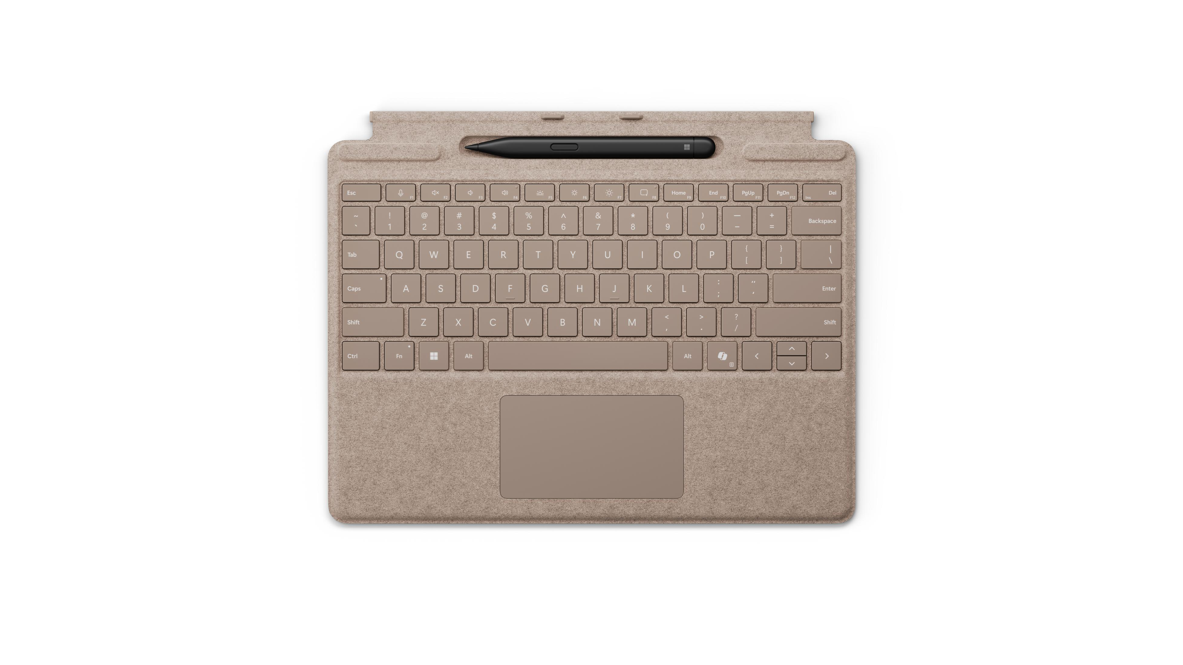 Vista dall'alto di una cover per tastiera beige, con una penna nera nel supporto.
