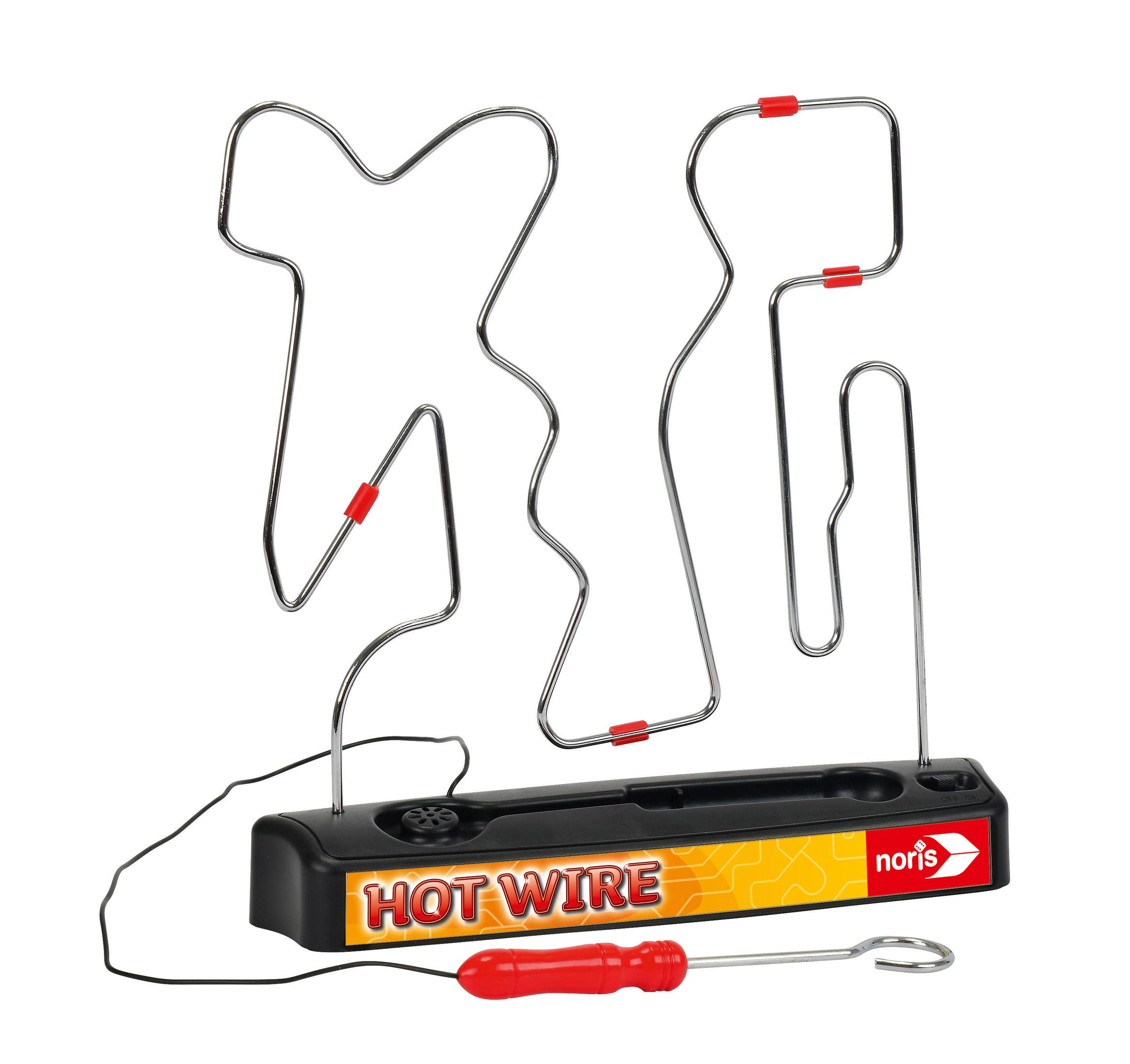 Jeu Hot Wire. Base noire avec labyrinthe en fil métallique et baguette à manche rouge. Étiquette jaune et rouge.