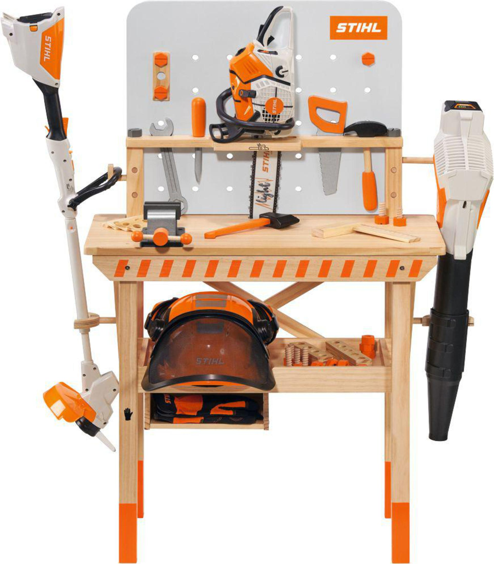 Stihl Spielzeug-Werkbank mit Werkzeugen und Ausrüstung. Weißer Hintergrund, orangefarbene Details.