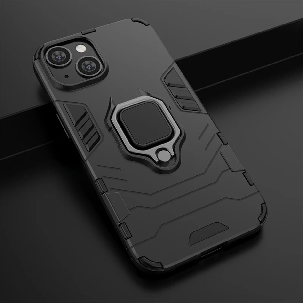Black phone case. Features a ring holder, and a rugged design with camera and button cutouts.