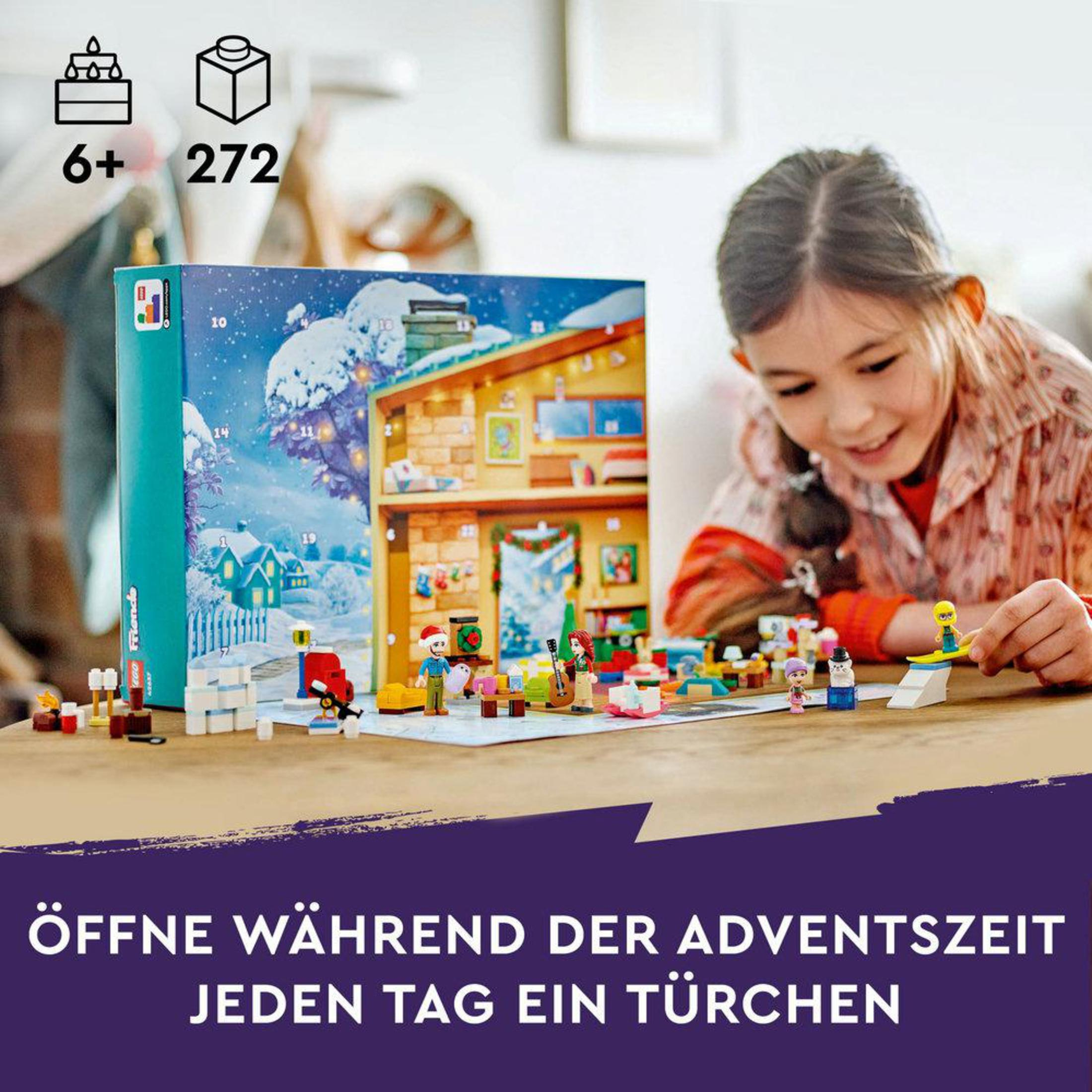 Niña jugando con un set de Lego, un calendario de Adviento con una escena de casa.