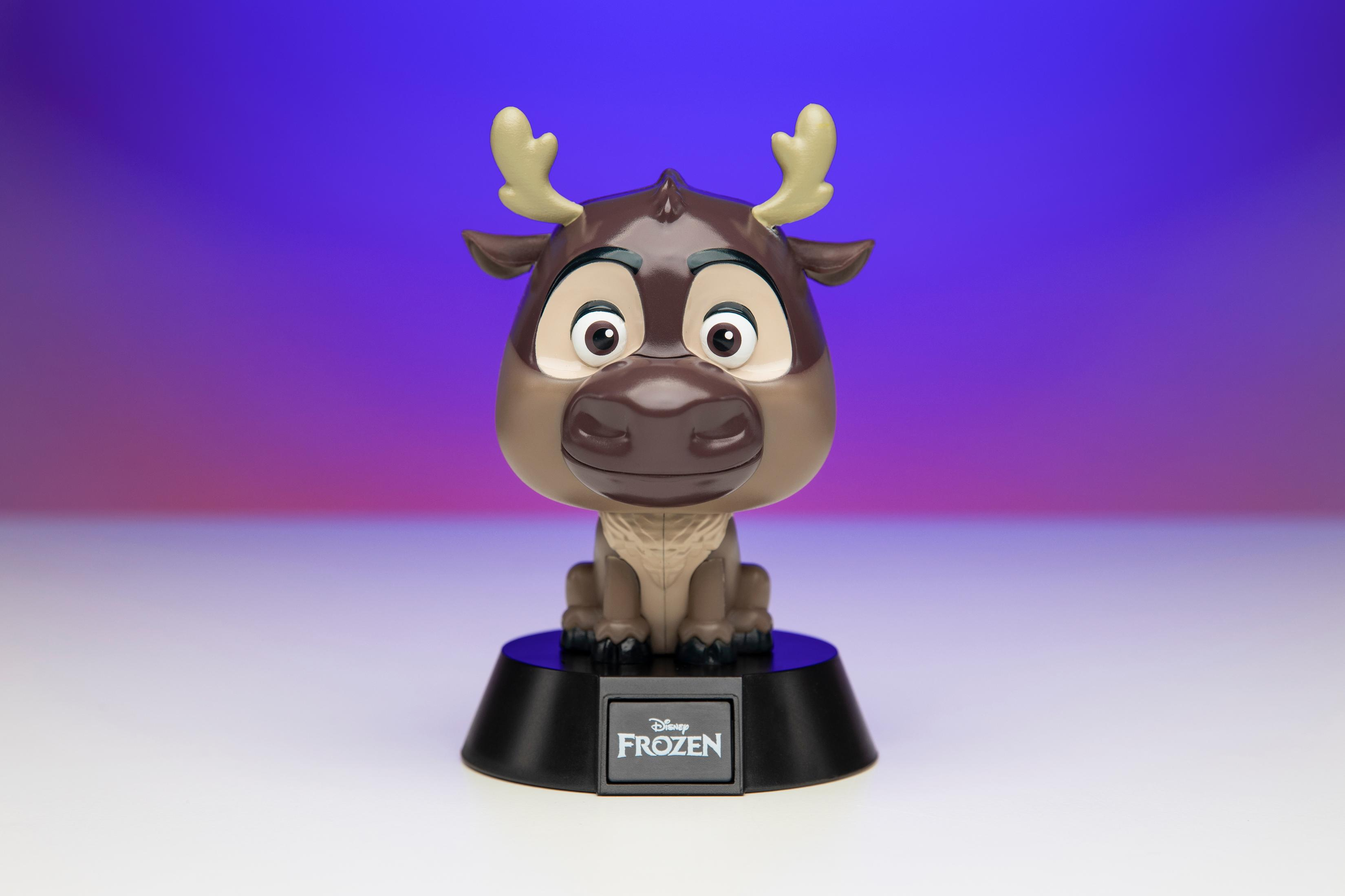 Sven-Wackelkopf aus Frozen. Ein Zeichentrick-Rentier mit schwarzer Basis. Lila und blauer Hintergrund.