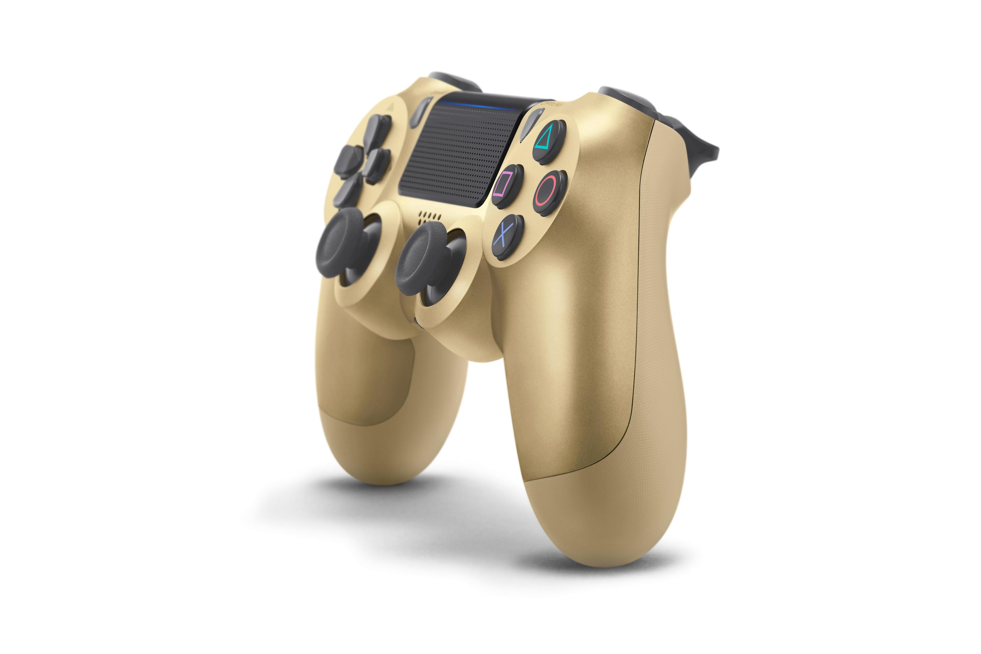 Goldener PlayStation 4 Controller auf weißer Oberfläche, nach oben geneigt.