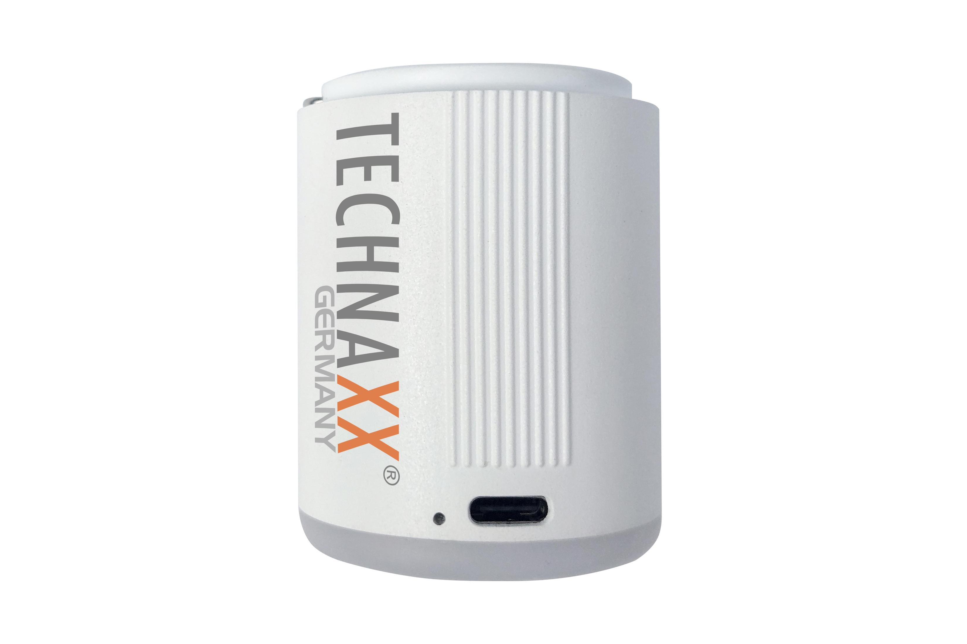 Weißes zylindrisches Gerät mit TECHNAXX Germany-Text und einem USB-Anschluss. Das Gerät steht auf weißem Hintergrund.