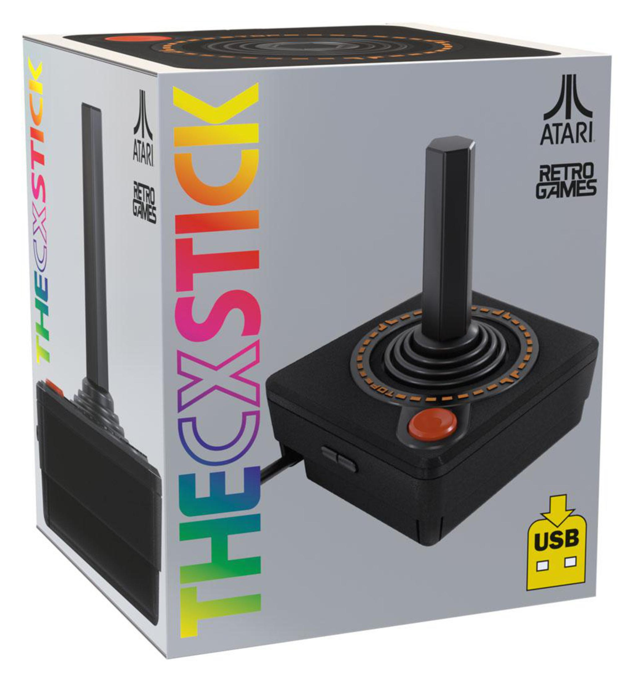 Zapakowany joystick Atari, czarny joystick z czerwonym przyciskiem, białe pudełko z kolorowym napisem "THE CXSTICK".
