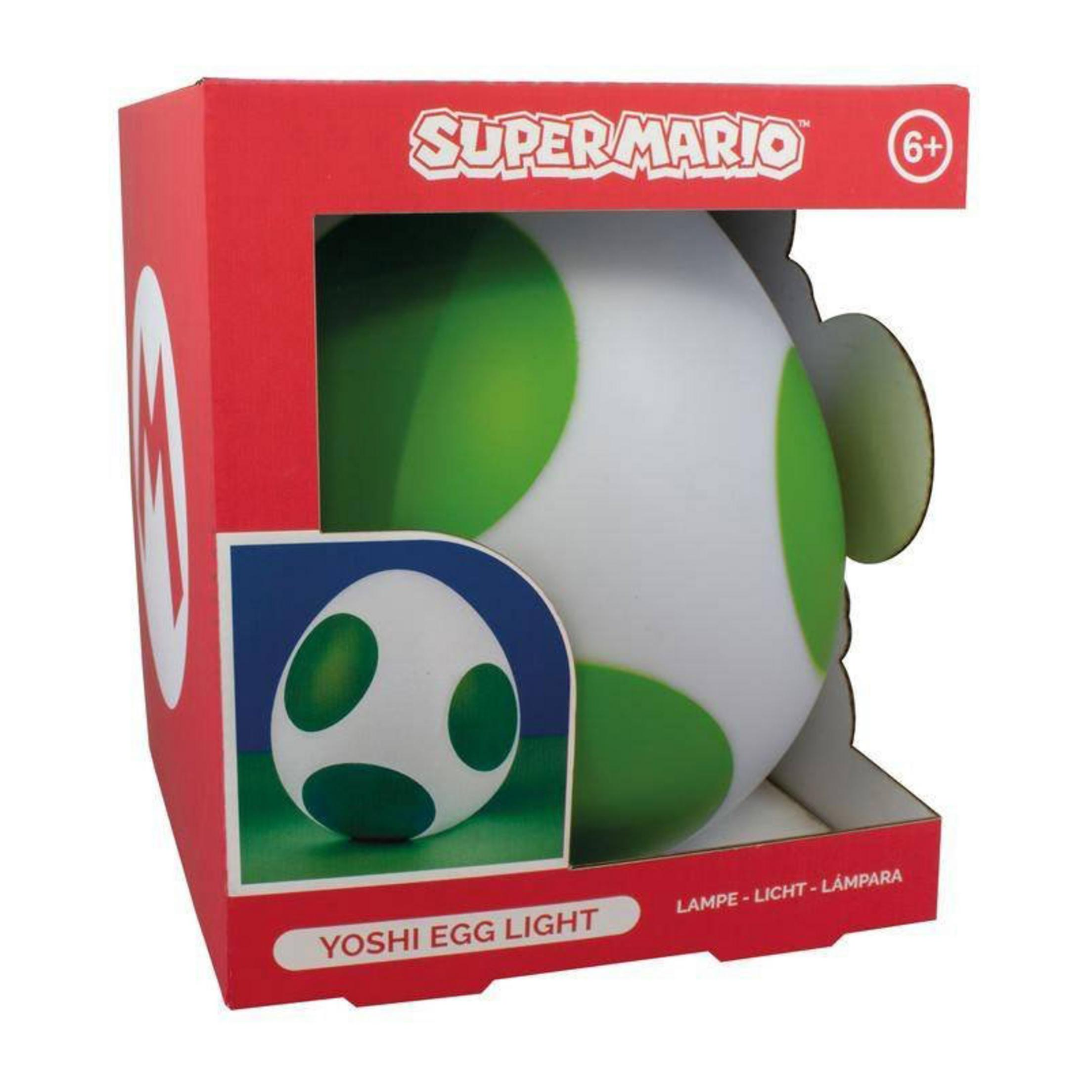 Une lumière œuf Yoshi Super Mario dans une boîte rouge. L'œuf a des taches vertes.