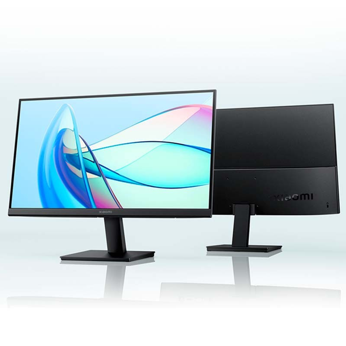 Dos monitores de computadora negros, uno de frente y otro mostrando su parte trasera.