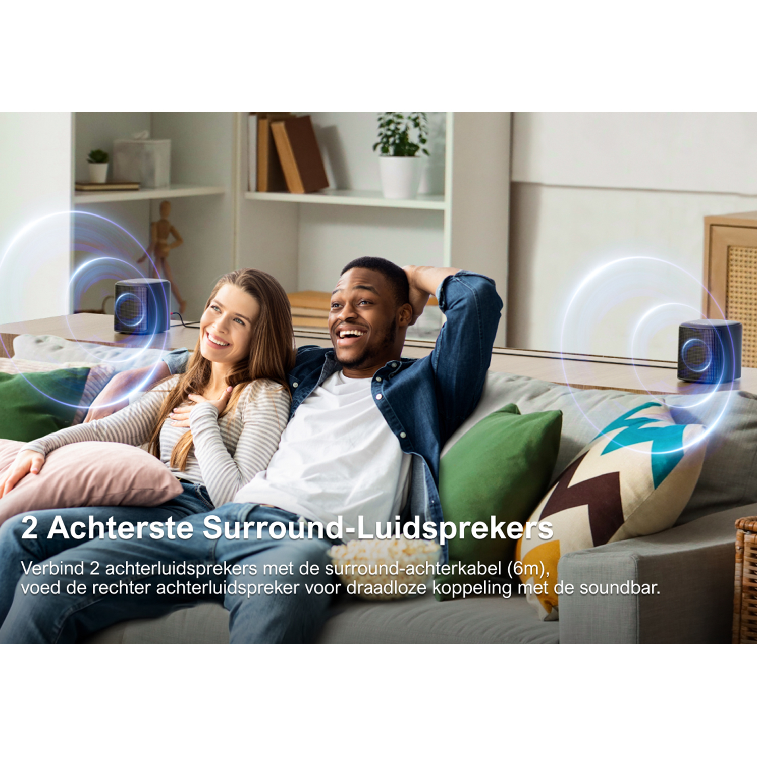 Two people smiling on a couch. Two speakers are on both sides, with sound waves.
