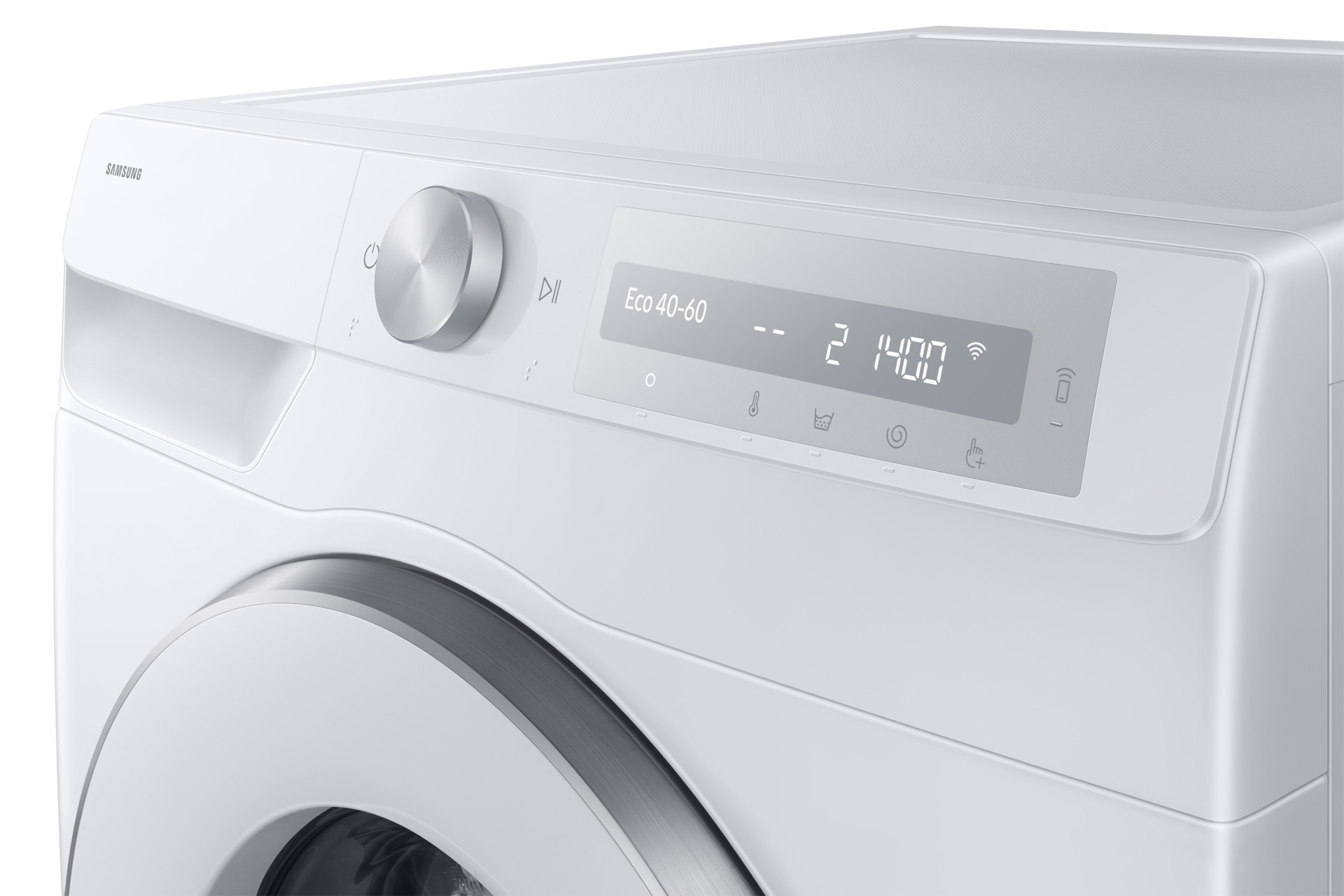 Parte superior de la lavadora blanca. Tiene una pantalla, un dial y botones. La marca es Samsung.