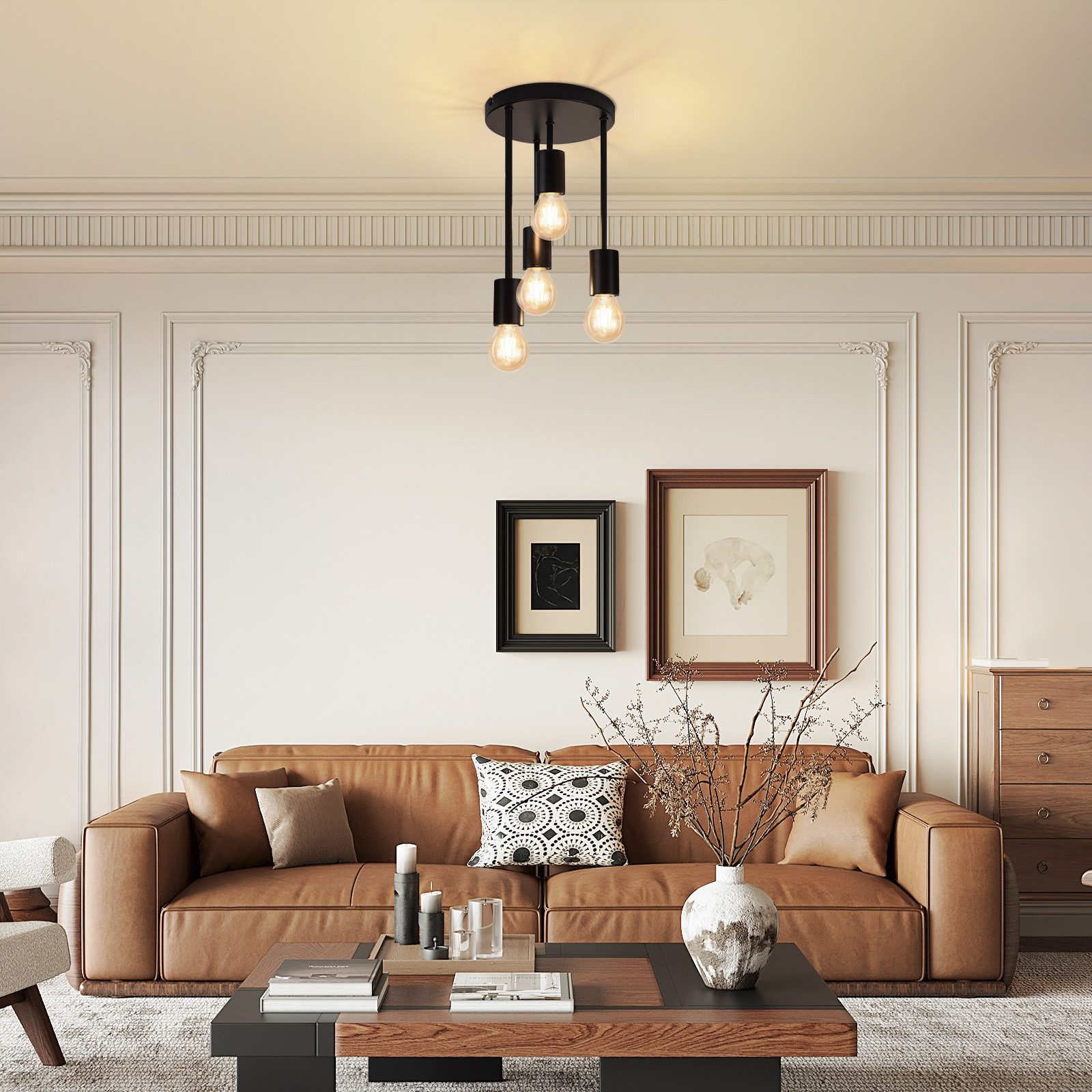 Nowoczesny salon z brązową sofą, czarnym stolikiem kawowym i lampą sufitową.