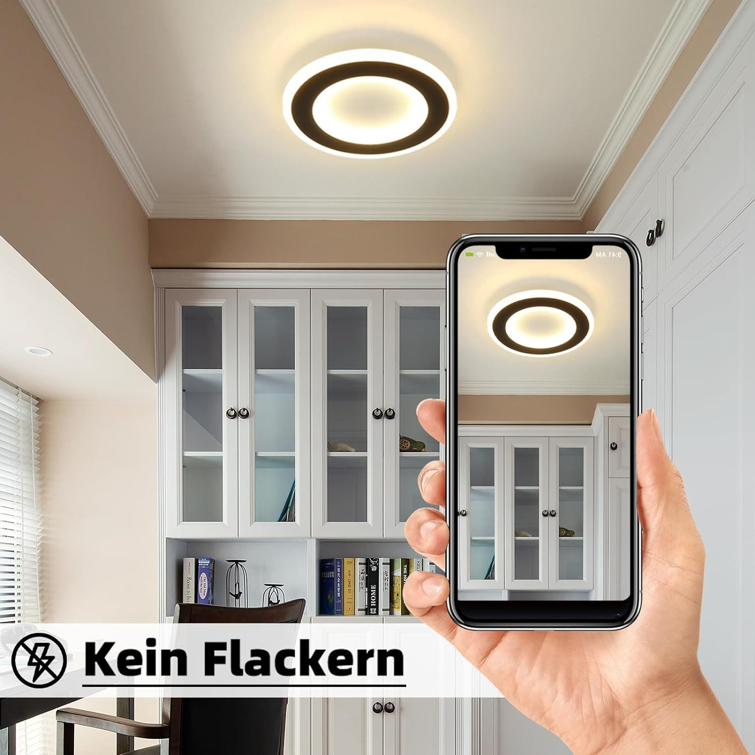 Ręka trzymająca telefon pokazujący okrągłą lampę sufitową.