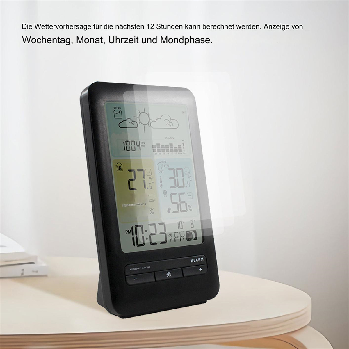 Schwarze Wetterstation mit Anzeige von Zeit, Temperatur und Wettervorhersage.