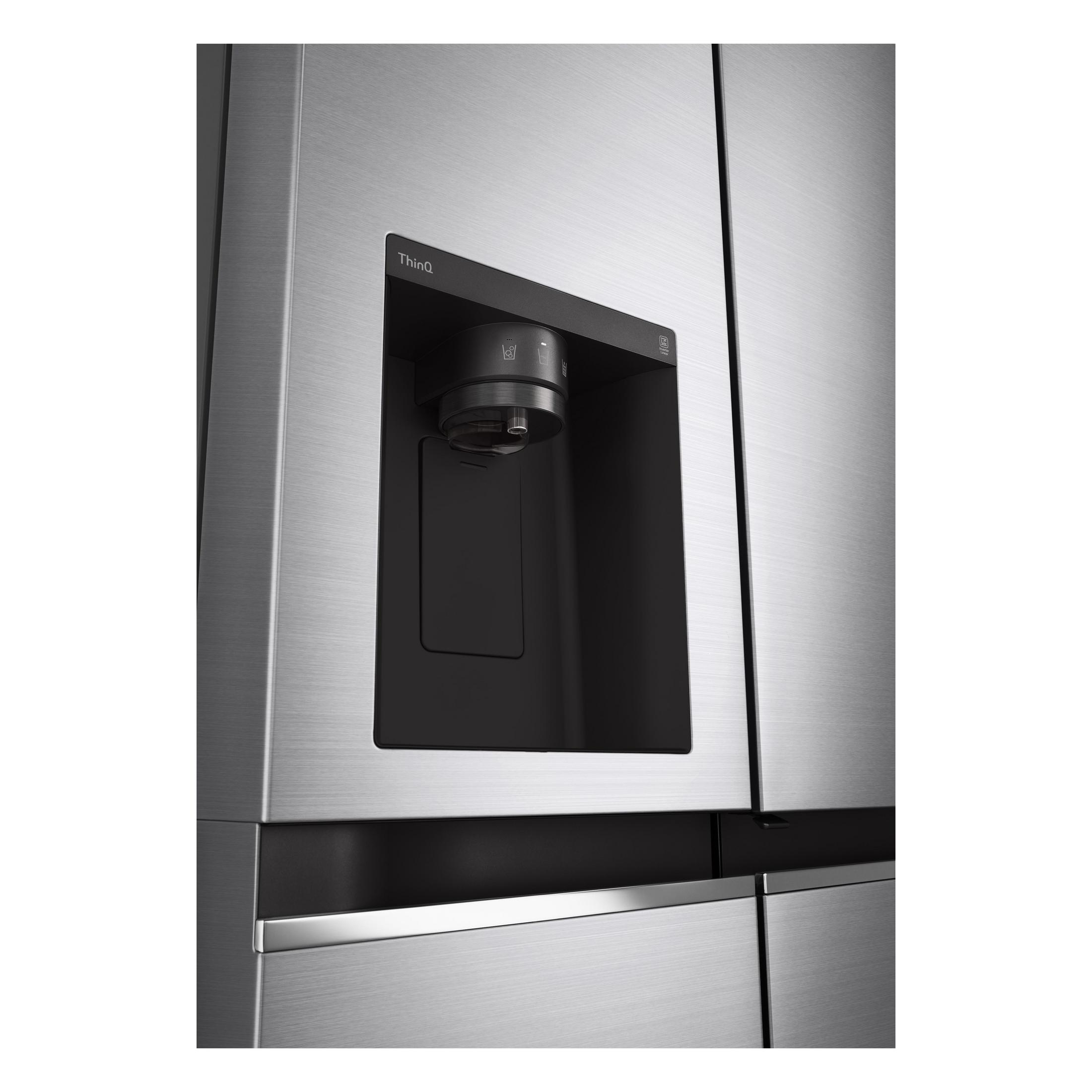 Frigorifero in acciaio inox con dispenser di acqua e ghiaccio sulla porta.