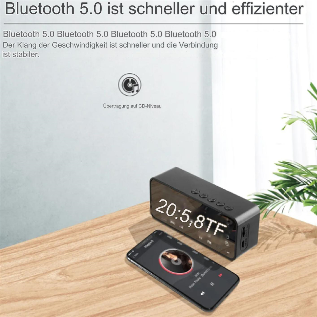 Ein schwarzer Lautsprecher mit Bildschirm, der Zeit anzeigt, und Telefon, das Musik zeigt. Text: Bluetooth 5.0 ist schneller.