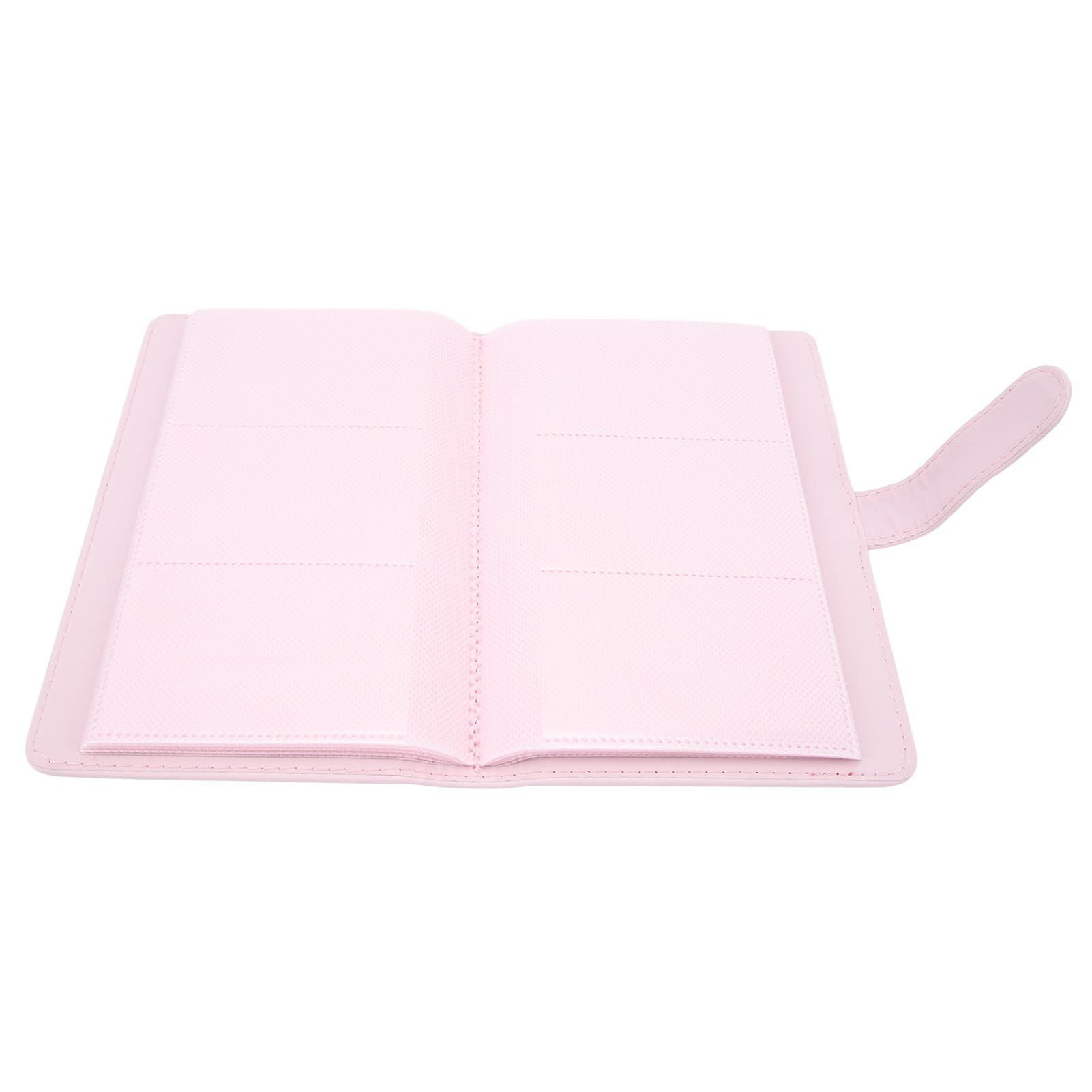 Offenes rosa Fotoalbum. Die Seiten sind leer mit vier Fotoschlitzen. Das Album ist offen.