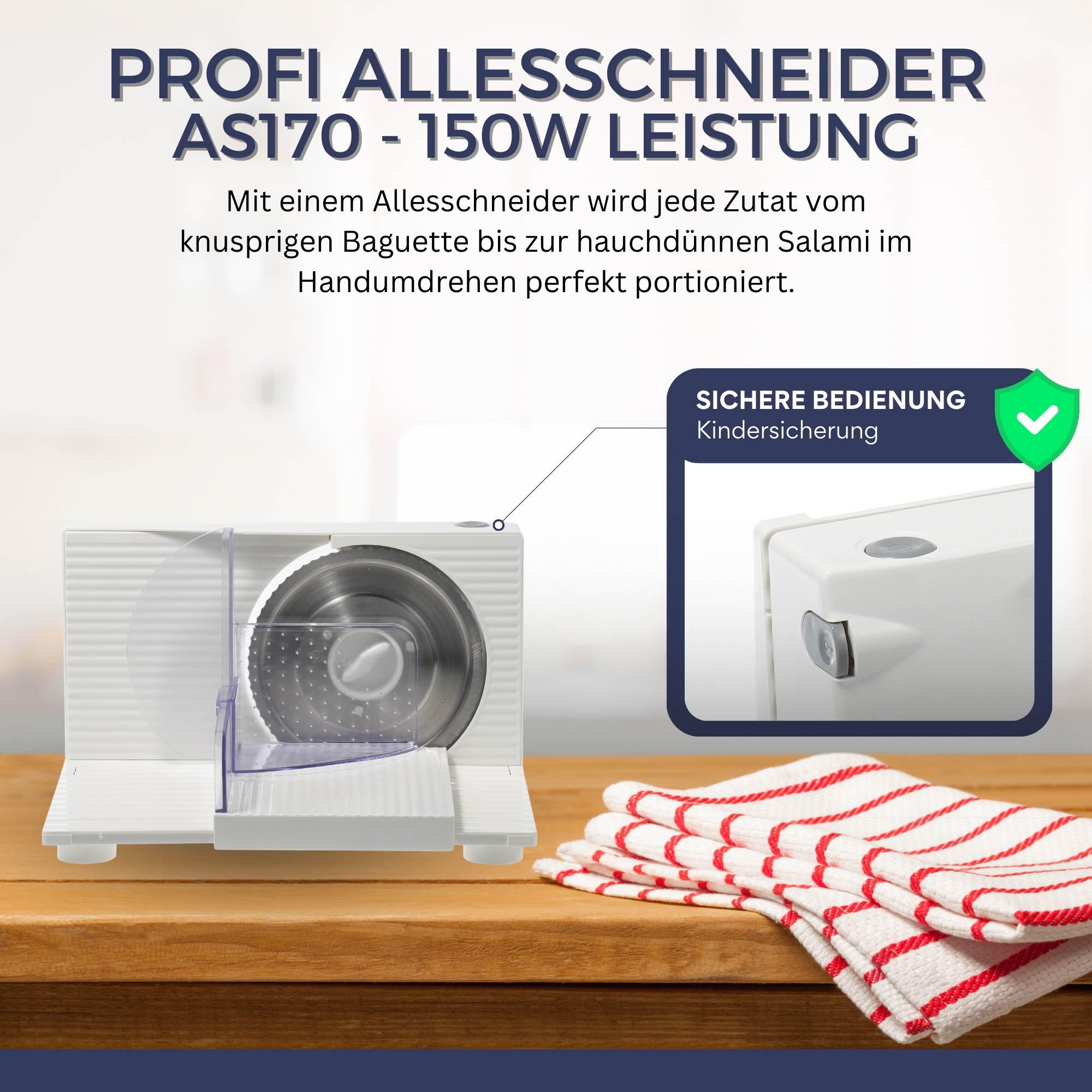 Ein weißer Lebensmittelschneider auf einem Holztisch. Enthält eine Klinge, einen Schutz und ein rot-weißes Tuch.