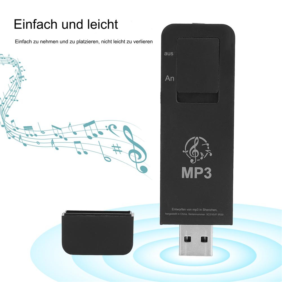 Schwarzer MP3-Player mit USB und separater Kappe. Noten sind links sichtbar.