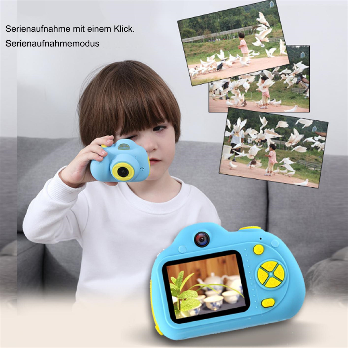 Ein Kind hält eine blaue Spielzeugkamera mit Bildern von Tauben und einem Kamerabildschirm.