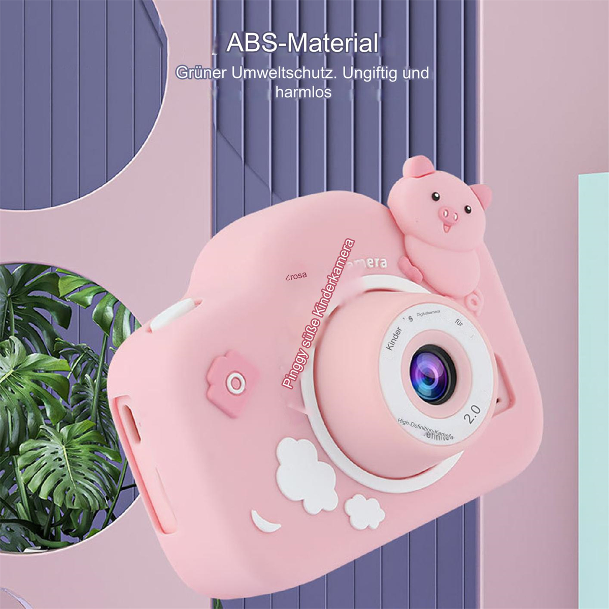 Rosa schweineförmige Kinderkamera mit einem Schwein oben. Weiße Wolken und Blätter schmücken die Kamera.