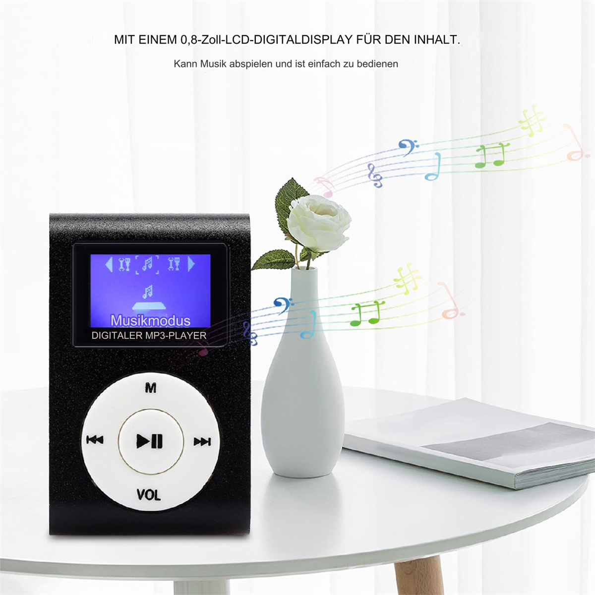Schwarzer MP3-Player mit blauem Bildschirm und eine weiße Vase mit einer weißen Rose und Noten.