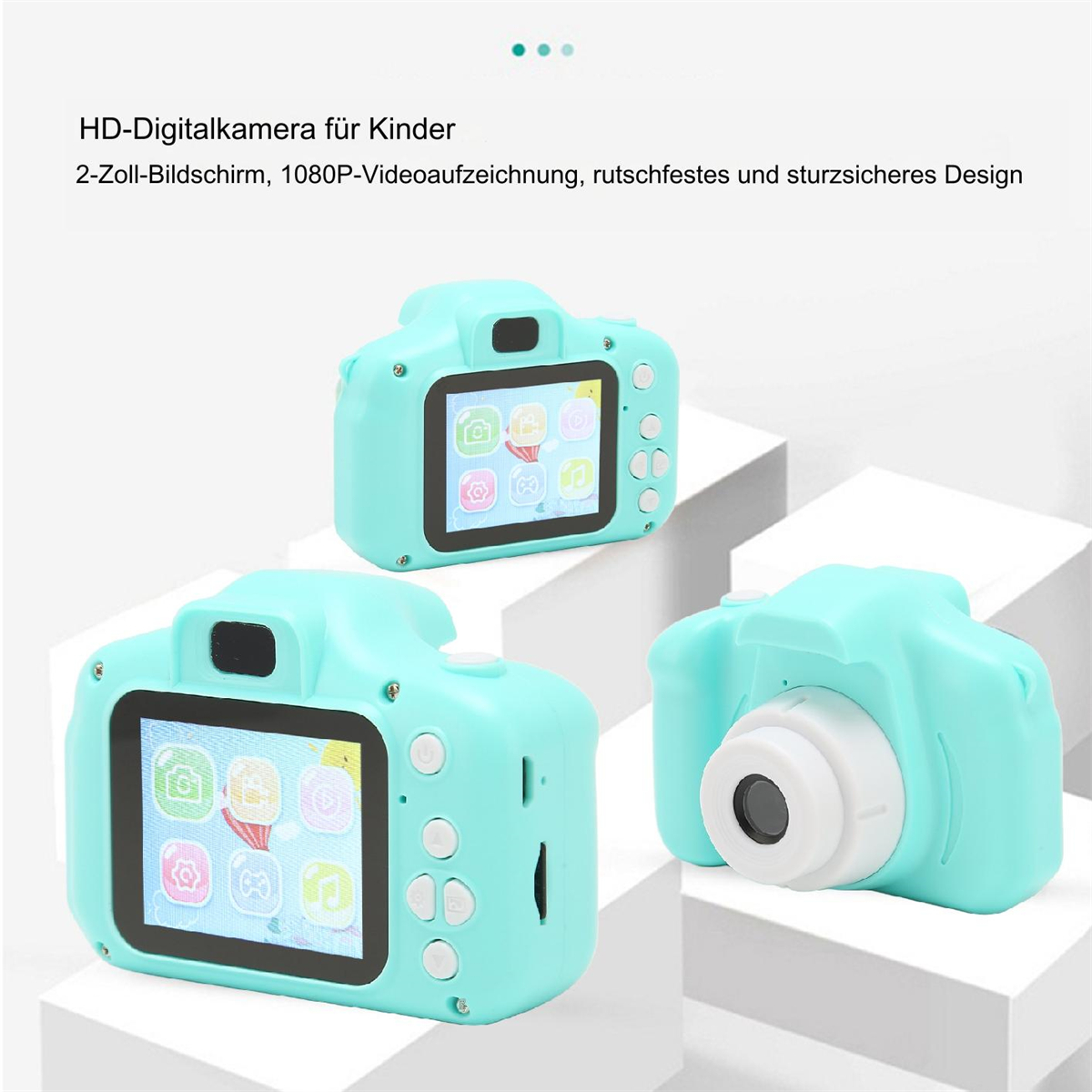 Drei türkisfarbene Digitalkameras für Kinder, jede mit einem Bildschirm, der Symbole anzeigt, im Studio.