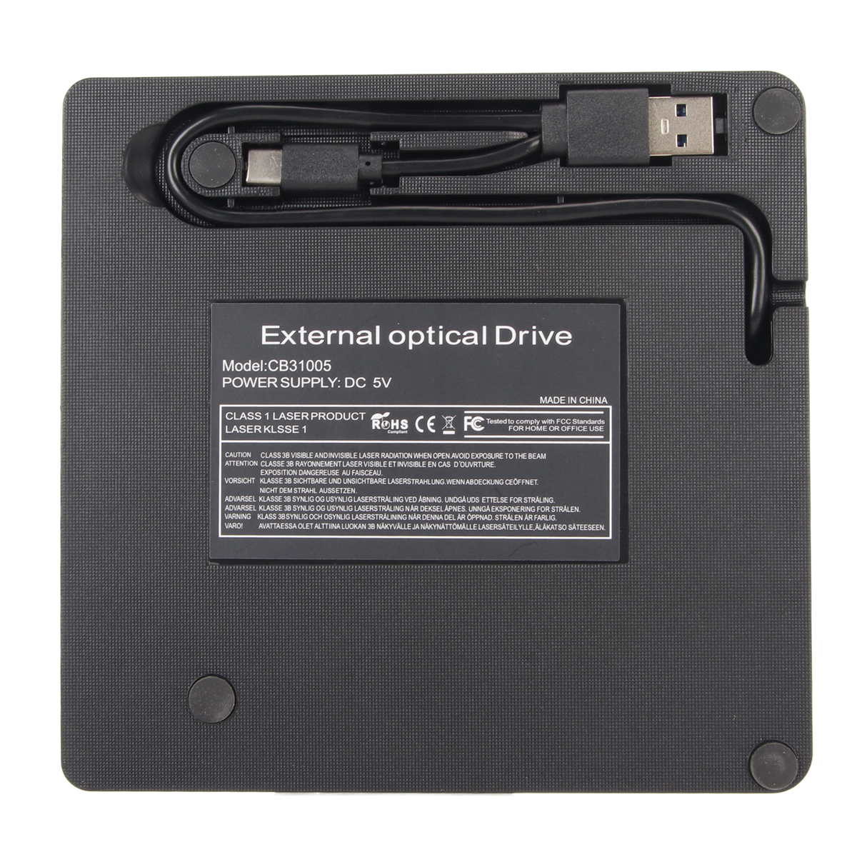Schwarzes externes optisches Laufwerk mit sichtbaren Etiketten und USB-Kabel.