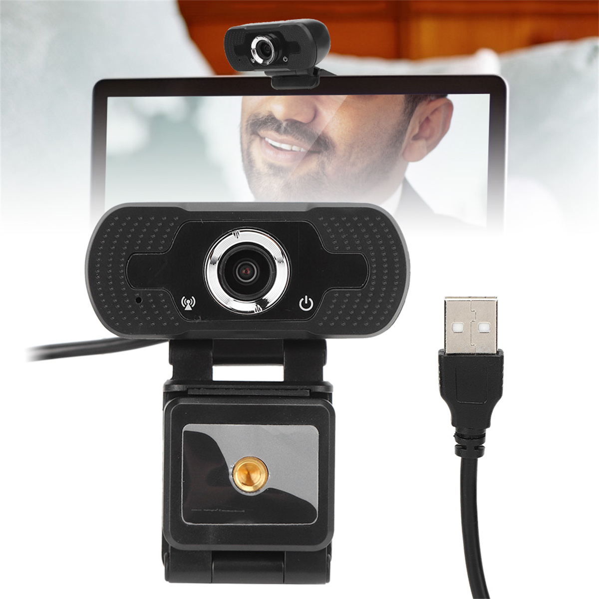 Schwarze Webcam mit einer Person auf einem Laptop-Bildschirm. USB-Kabel ist angeschlossen.