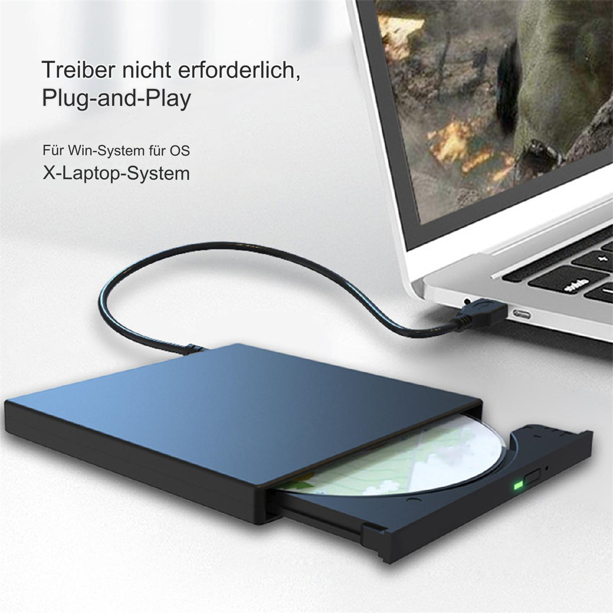Schwarzes DVD-Laufwerk an Laptop angeschlossen, Disc innen, auf weißer Oberfläche mit Text.