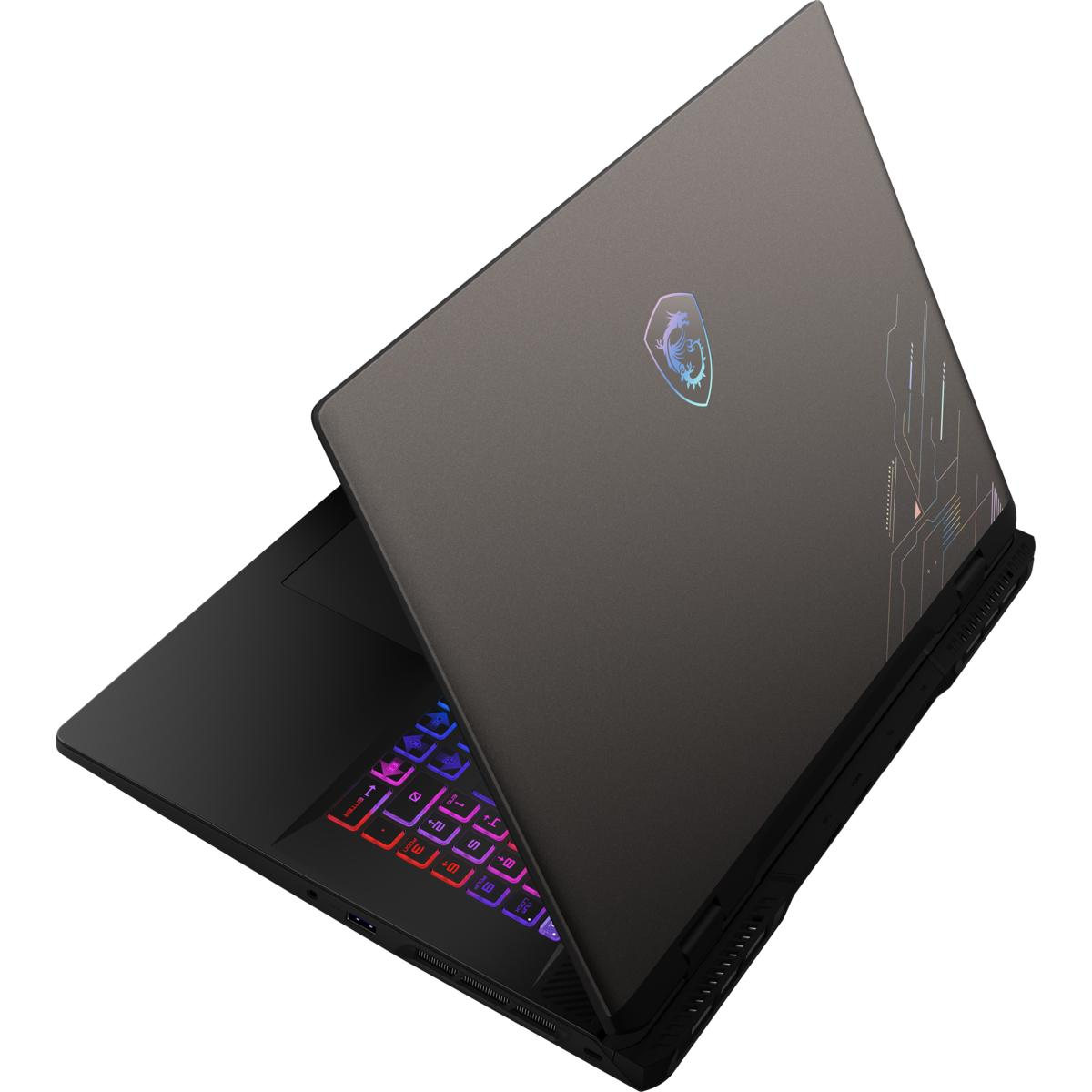 Laptop mit geöffnetem Deckel, Tastatur und Bildschirm sichtbar.