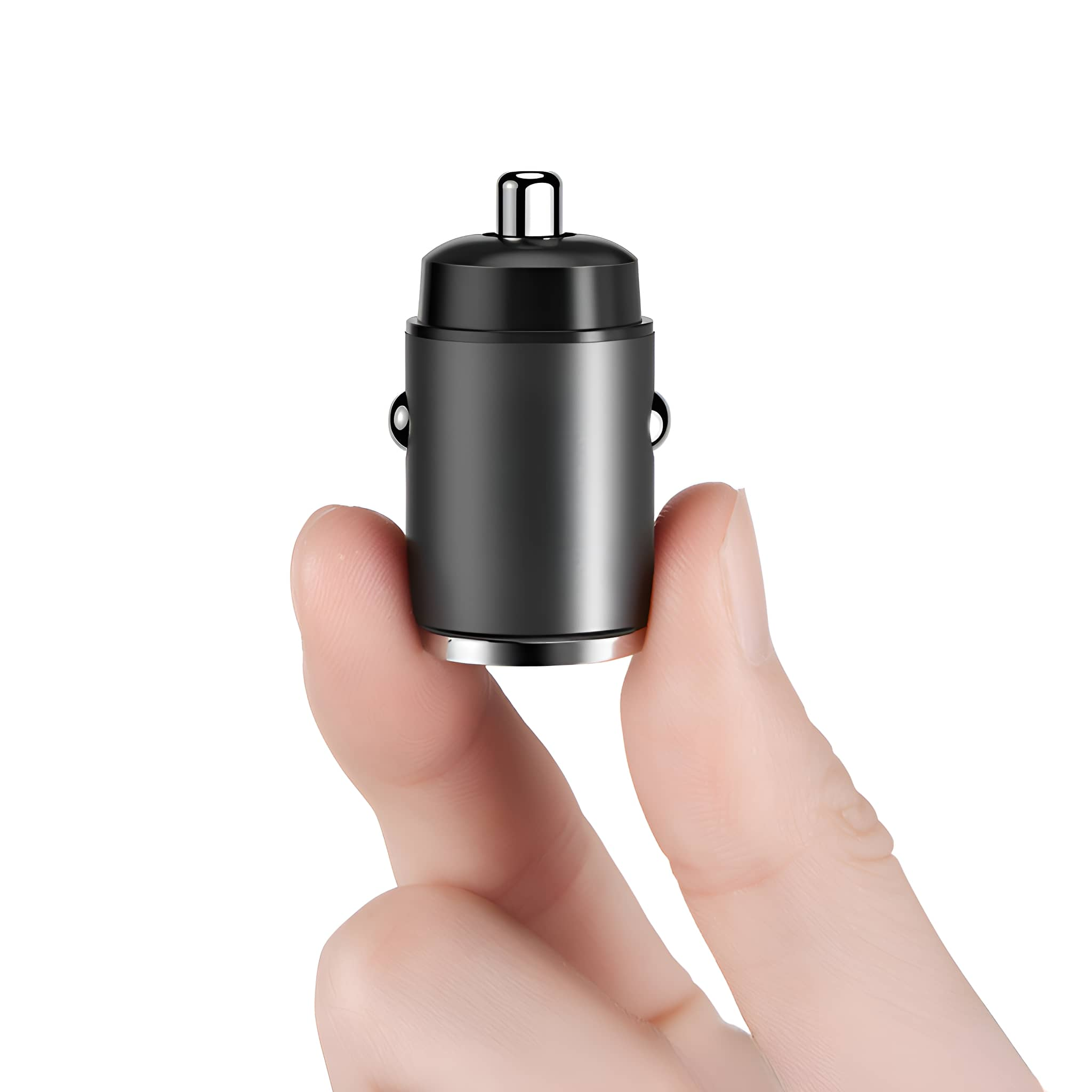 Kleines, schwarzes Autoladegerät in einer Hand. Zylindrische Form, metallisch silberne Spitze.