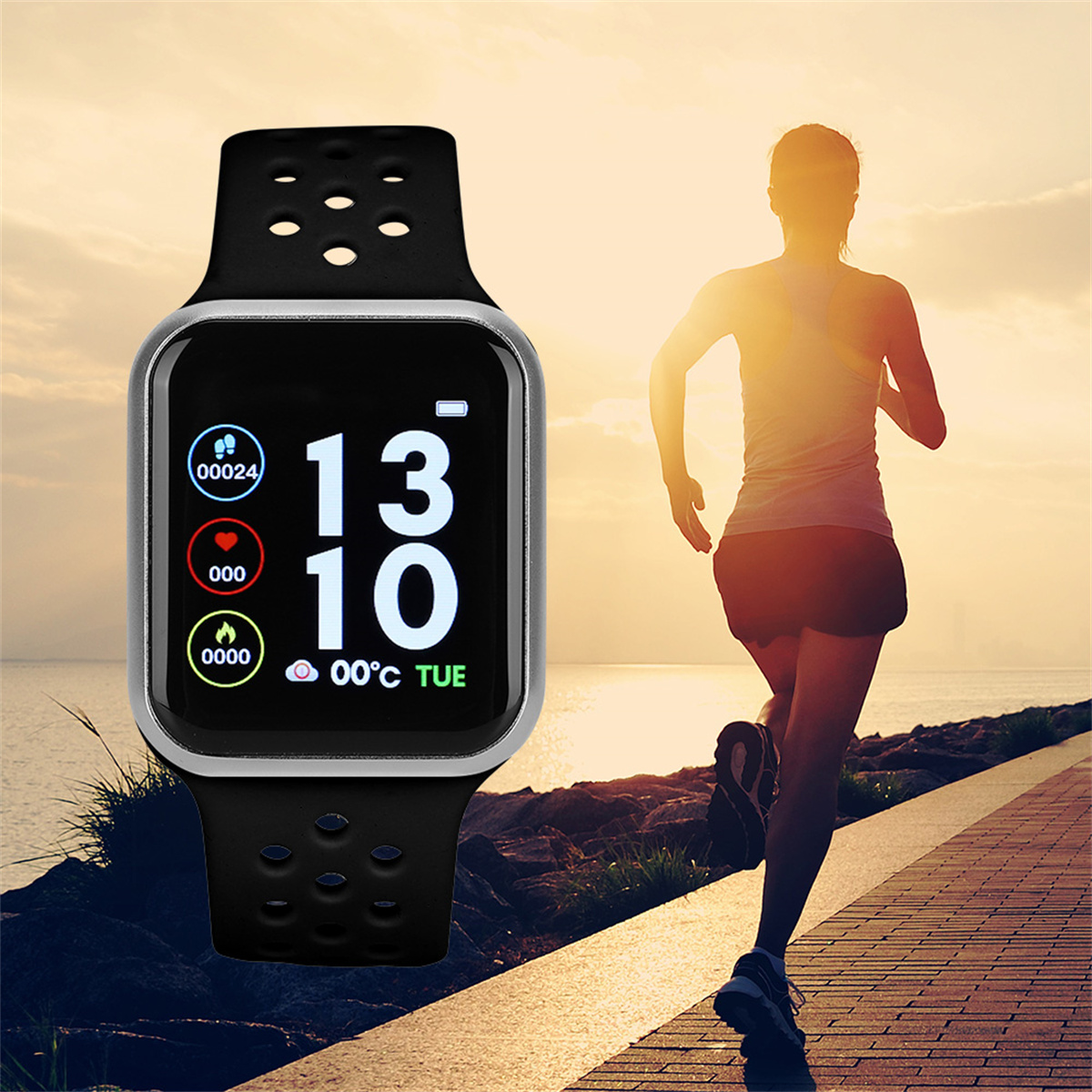 Smartwatch am Handgelenk, zeigt Zeit und Statistiken. Ein Läufer rennt auf einem Weg am Meer.