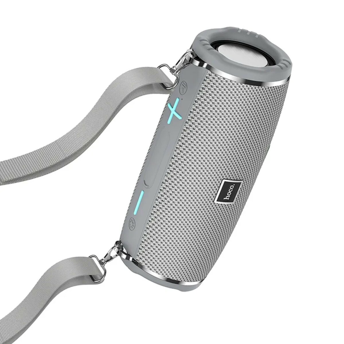 Un altoparlante portatile grigio con una cinghia. Ha pulsanti e un logo sul lato.