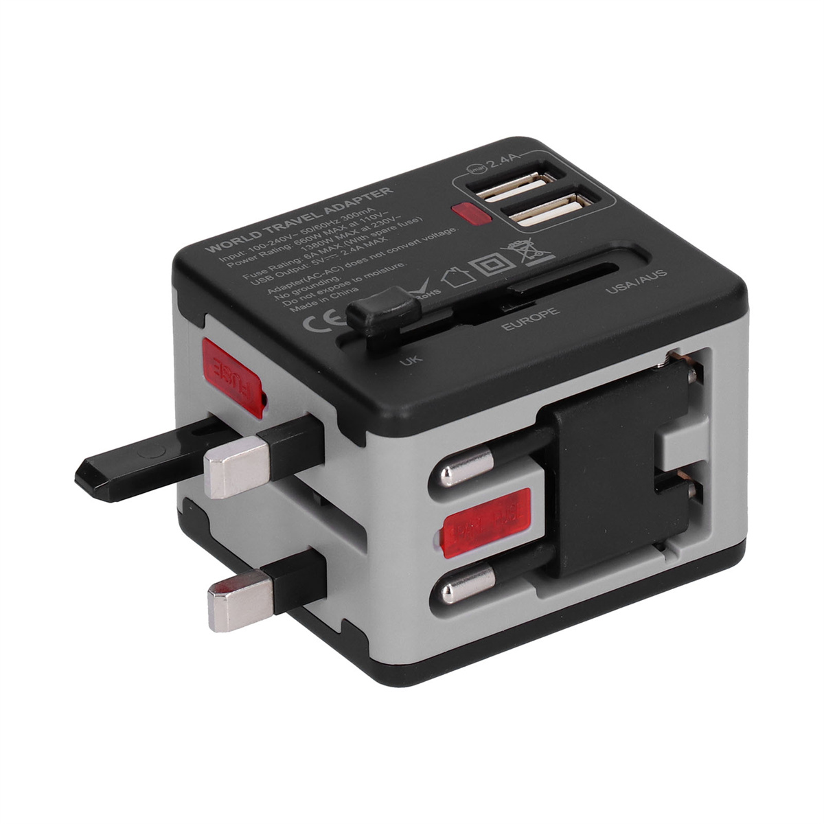 Ein Weltreiseadapter mit verschiedenen Steckertypen. Er ist schwarz und grau, mit USB-Anschlüssen.