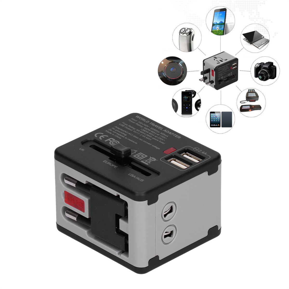 Weltreiseadapter mit verschiedenen Steckertypen. Mit USB-Anschlüssen, umgeben von kleinen Geräten.