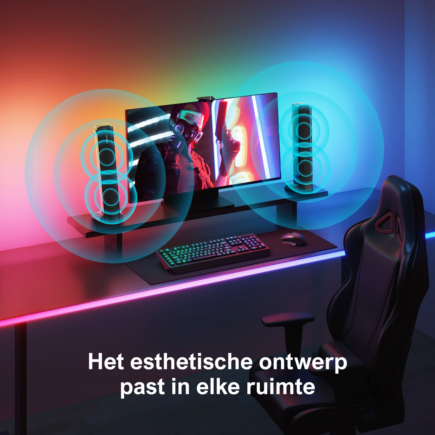 Gaming setup, monitor with visuals, speakers with light rings, black chair.