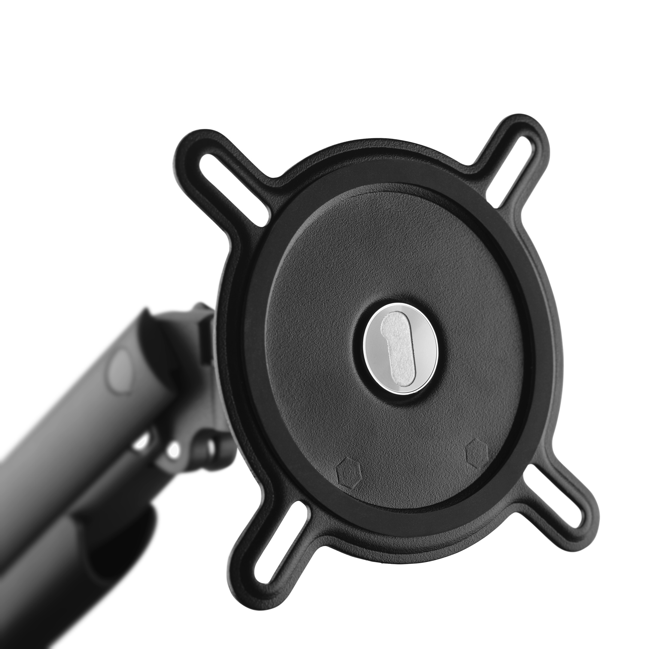 Close-up van een monitorarmbevestiging. Zwart en heeft een ronde montageplaat.