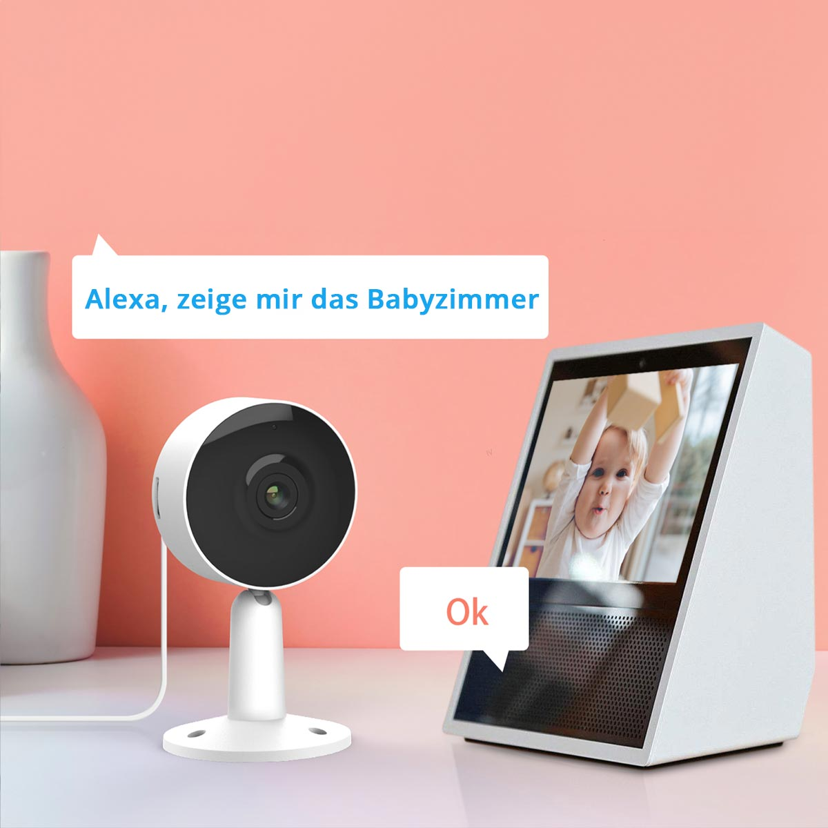 Ein Babyphone-Setup mit Kamera und Display. Das Display zeigt ein Baby. Sprechblasen zeigen Interaktion.