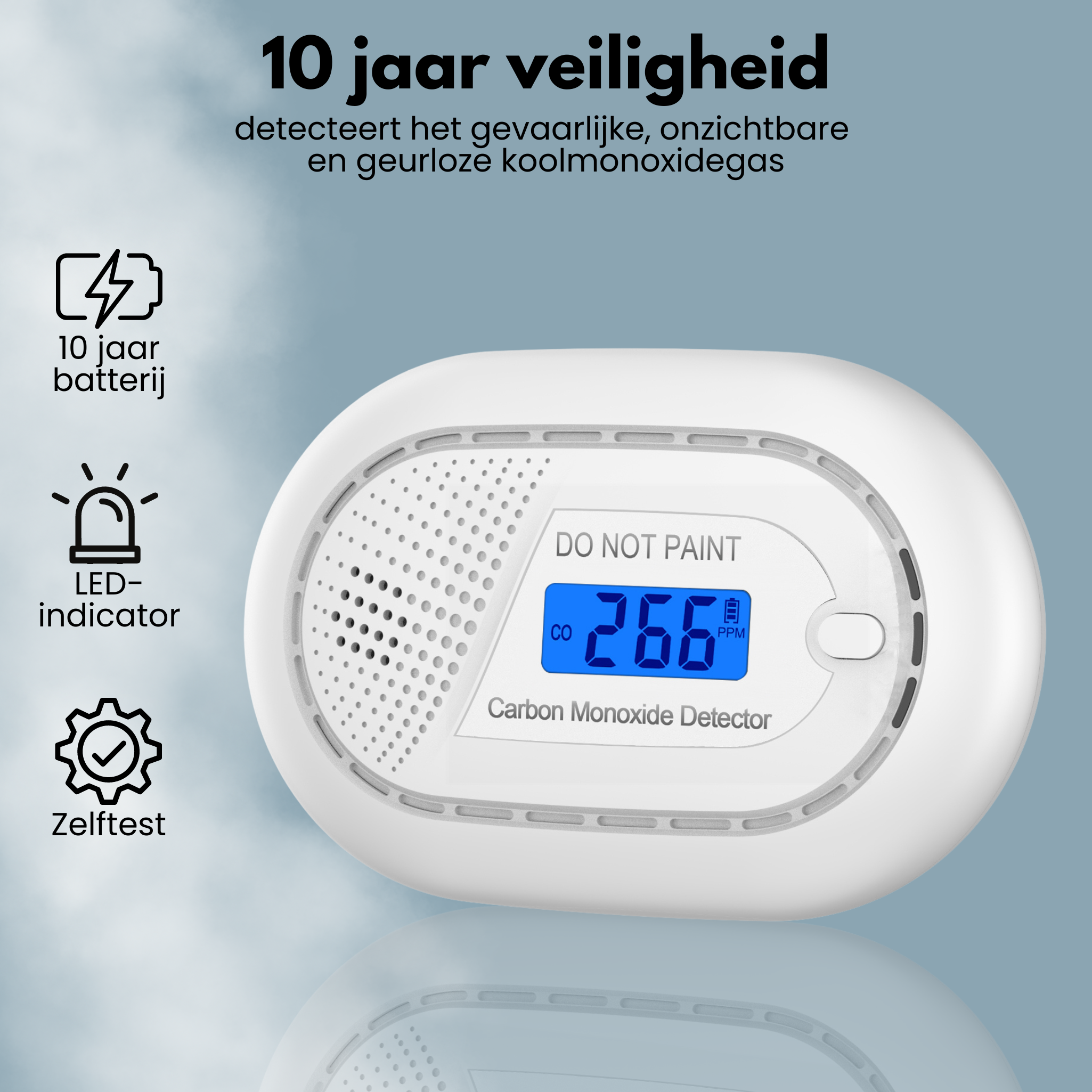 White carbon monoxide detector with a screen showing 266PPM. Text and icons on the device.