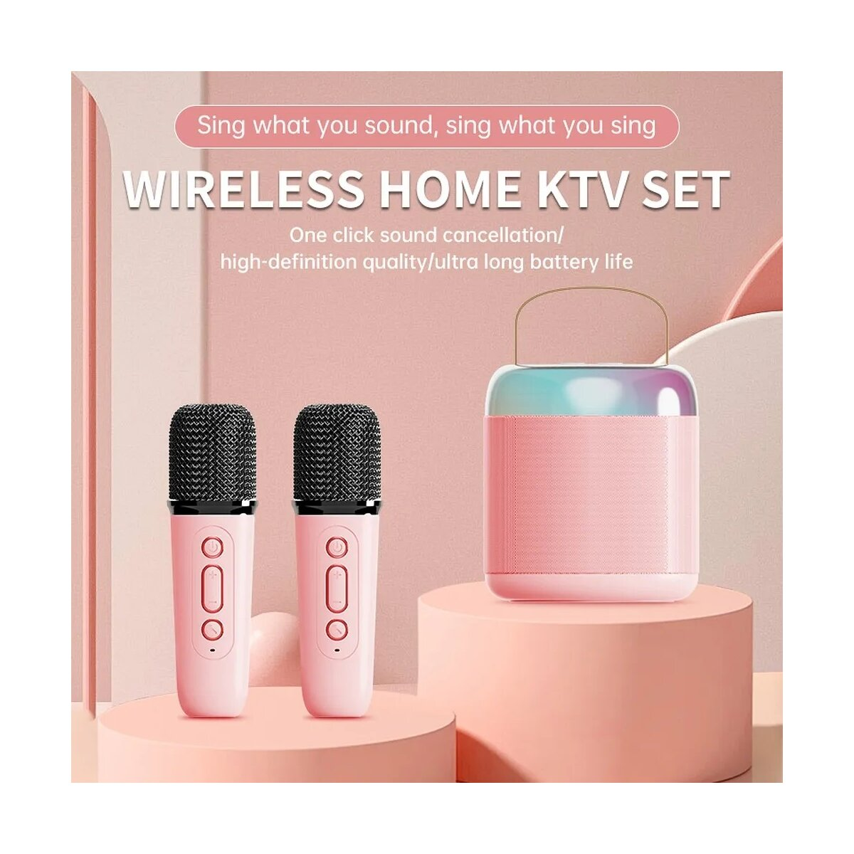 Pinkfarbenes kabelloses Karaoke-Set mit zwei Mikrofonen und einem Lautsprecher. Text: Kabelloses Home-KTV-Set.