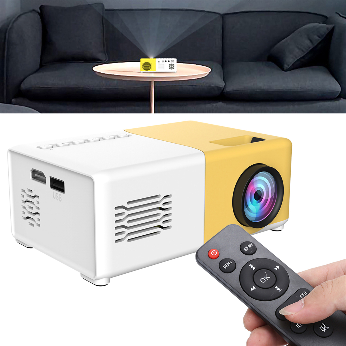 Kleiner gelb-weißer Projektor mit Fernbedienung auf einem Tisch.
