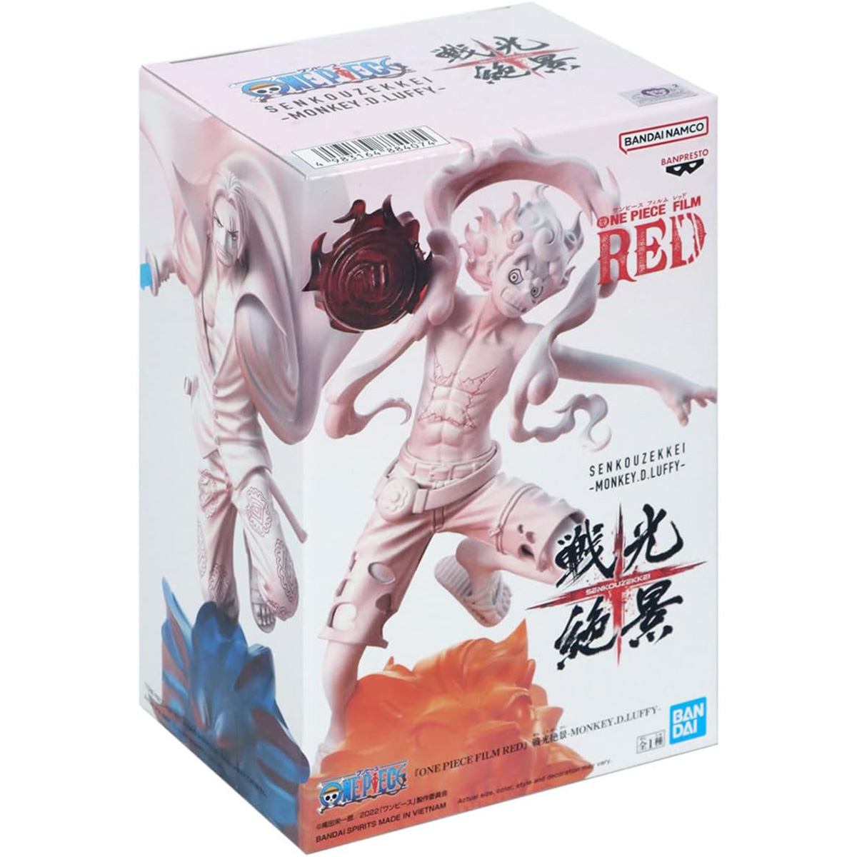 Caja con una figura de anime One Piece Red. La figura es de Luffy en una pose de lucha.