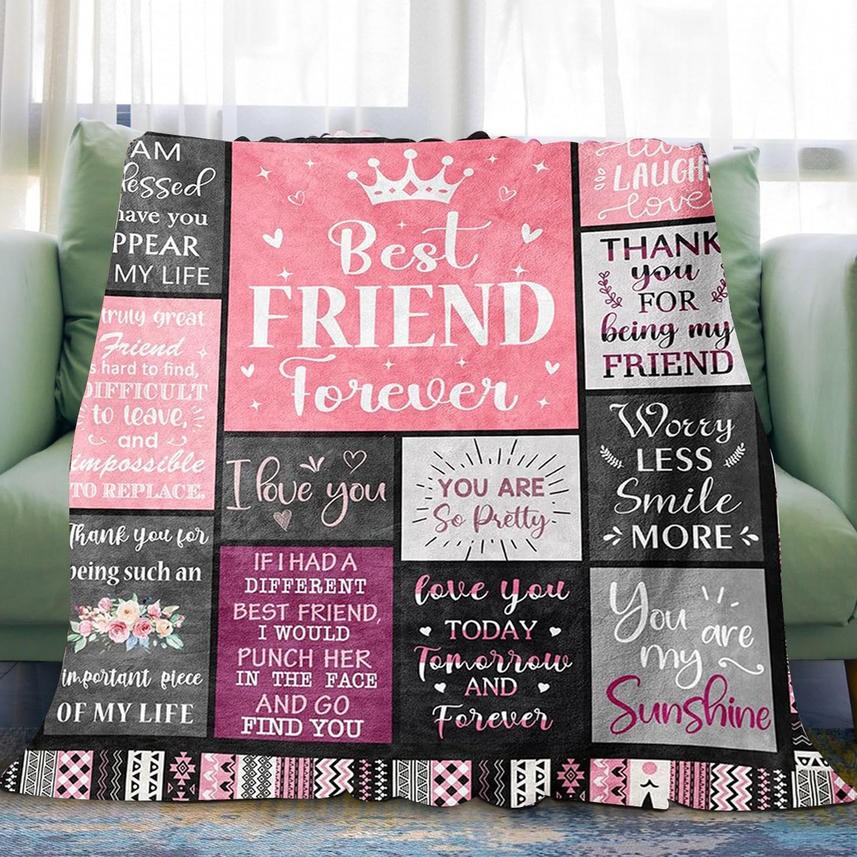 Eine rosa Decke auf einem grünen Sofa mit Text, darunter 'Best Friend Forever'.