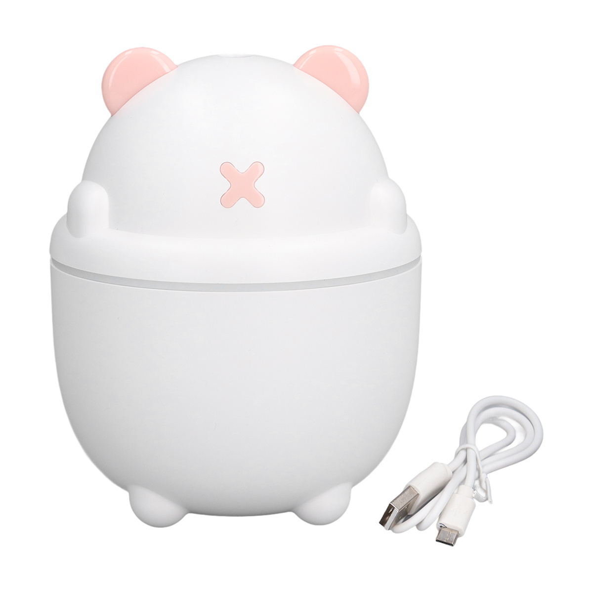 Ein weißer, bärenförmiger Luftbefeuchter mit rosa Ohren und einem Kreuz. USB-Kabel an der Seite.