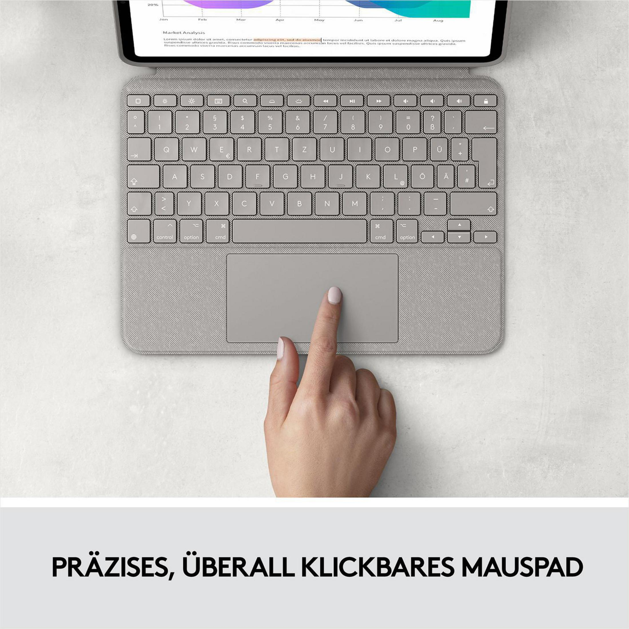 Hand auf Tastatur mit Touchpad. Die Tastatur ist grau, mit Tasten und einem kleinen Touchpad.