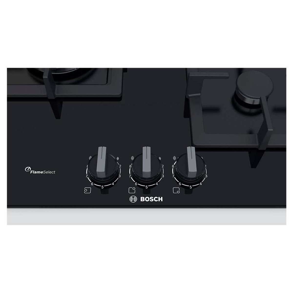 Czarna płyta grzewcza ze szkła z trzema pokrętłami. Pokrętła są srebrne.