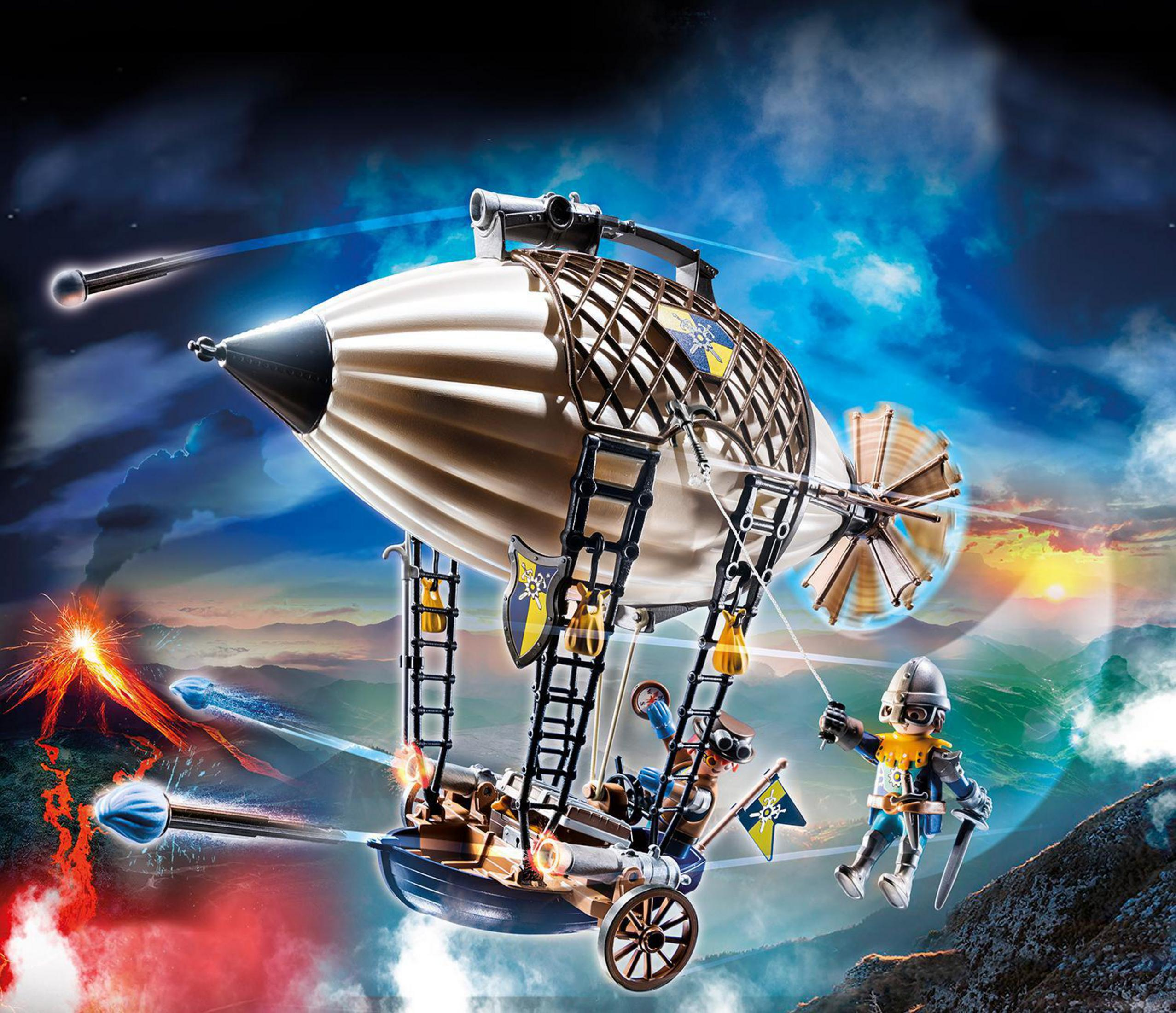 Juguete de dirigible Playmobil Novelmore con figuras, un cañón y un telón de fondo de paisaje volcánico.
