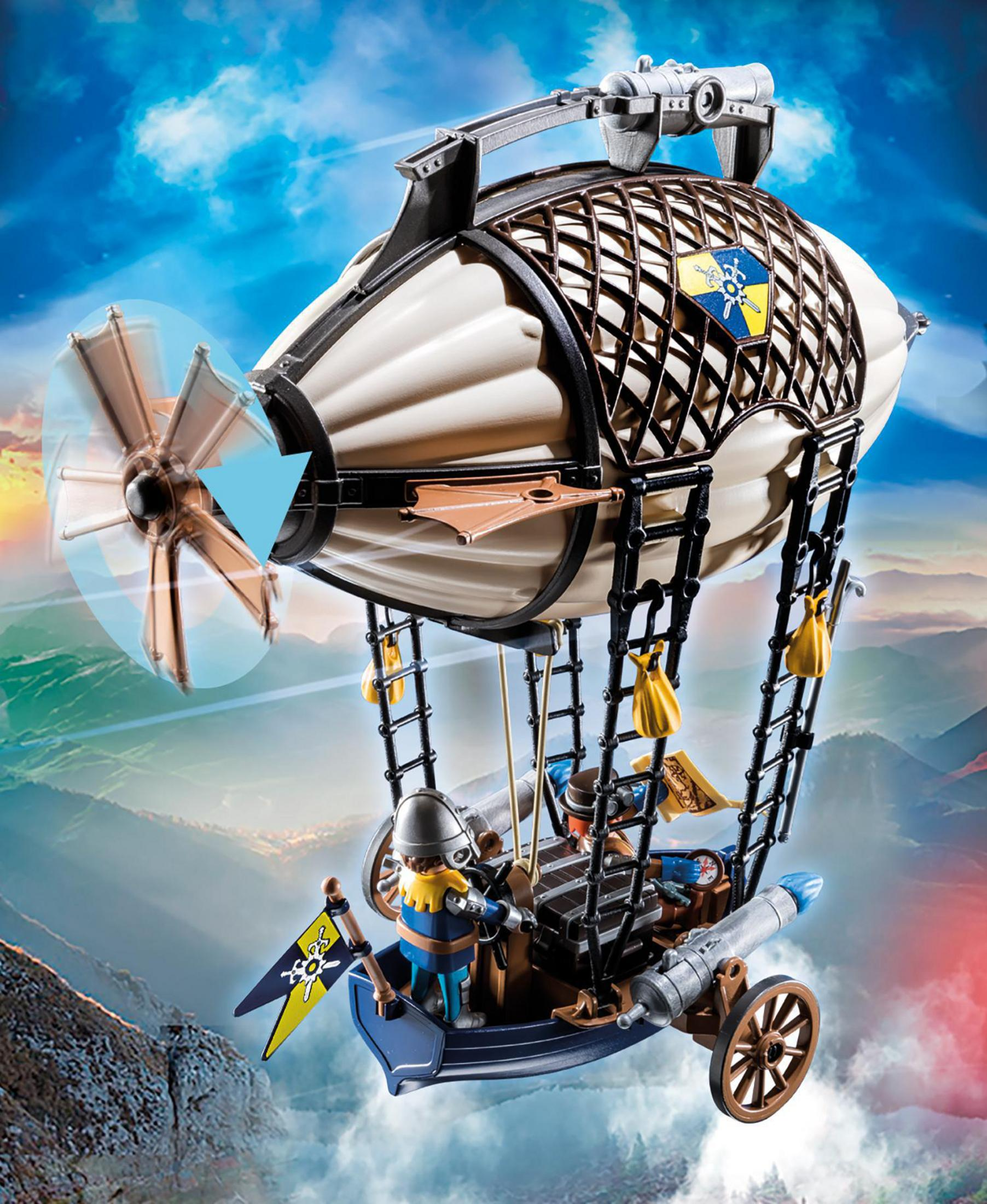 Juguete de dirigible Playmobil Novelmore con figuras, un cañón, una hélice y un fondo de montaña.