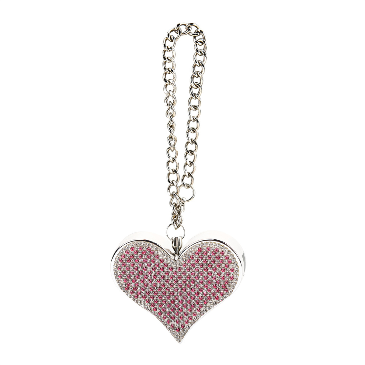 Eine herzförmige Geldbörse mit rosa Edelsteinen und einer silbernen Kette.