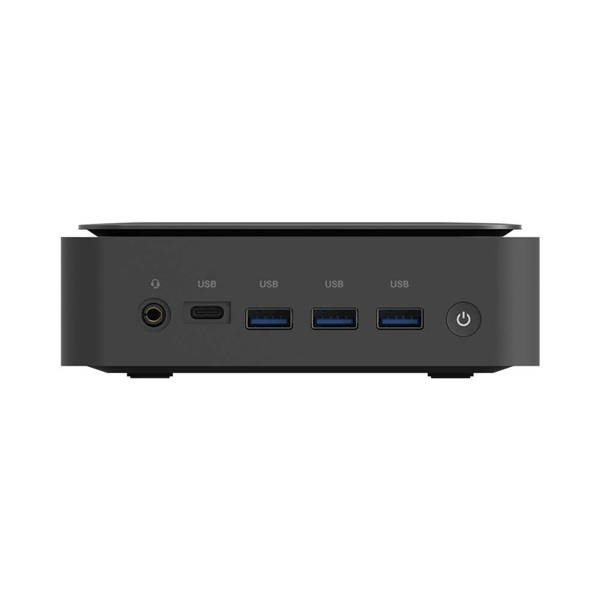 Una computadora pequeña, negra y rectangular con múltiples puertos USB y un botón de encendido en el frente.