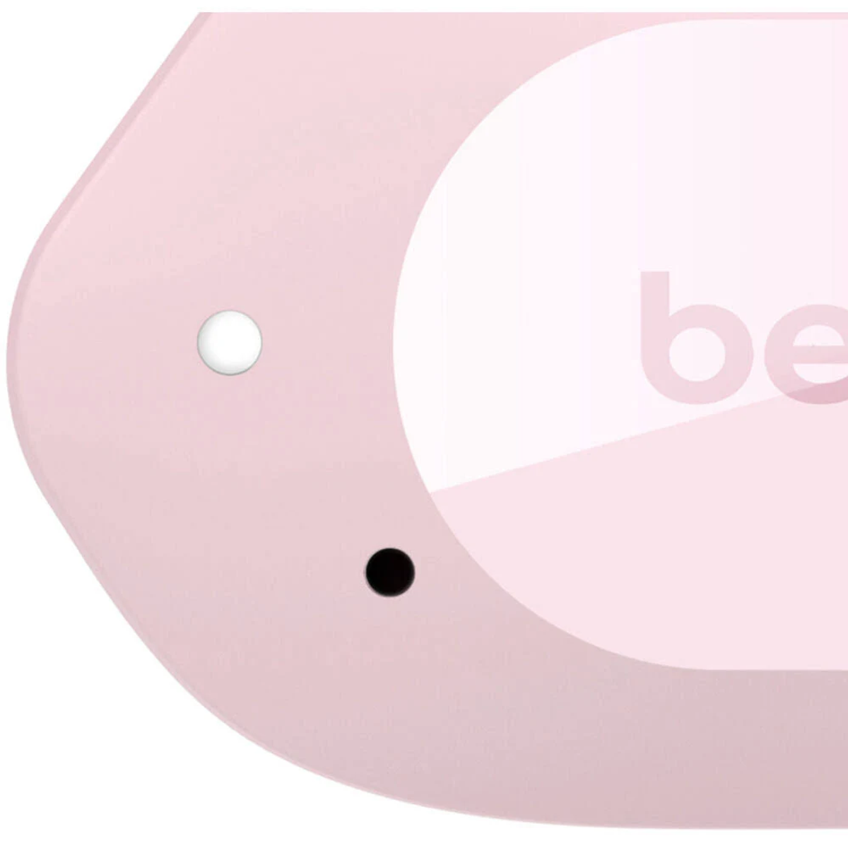 Dispositivo doméstico inteligente rosa con un botón y un agujero. Fondo blanco.